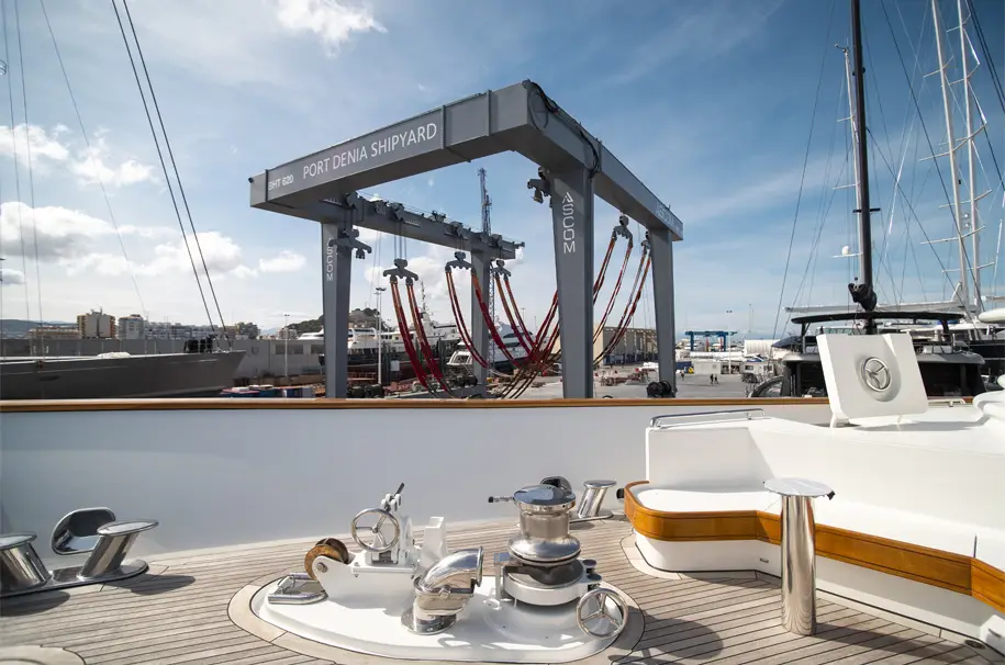 yacht and travelift on the shipyard